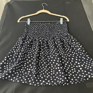 Short polka dot flowy skirt